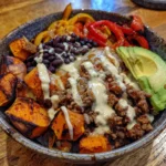 High protein taco bowl with beef, sweet potatoes, and beans